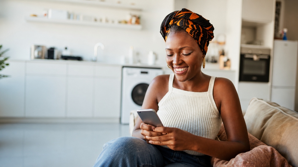 Woman smiling at phone